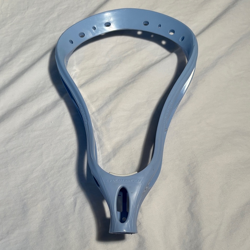 Warrior Lacrosse Head in Light Blue - brand new w/o tag, never strung.